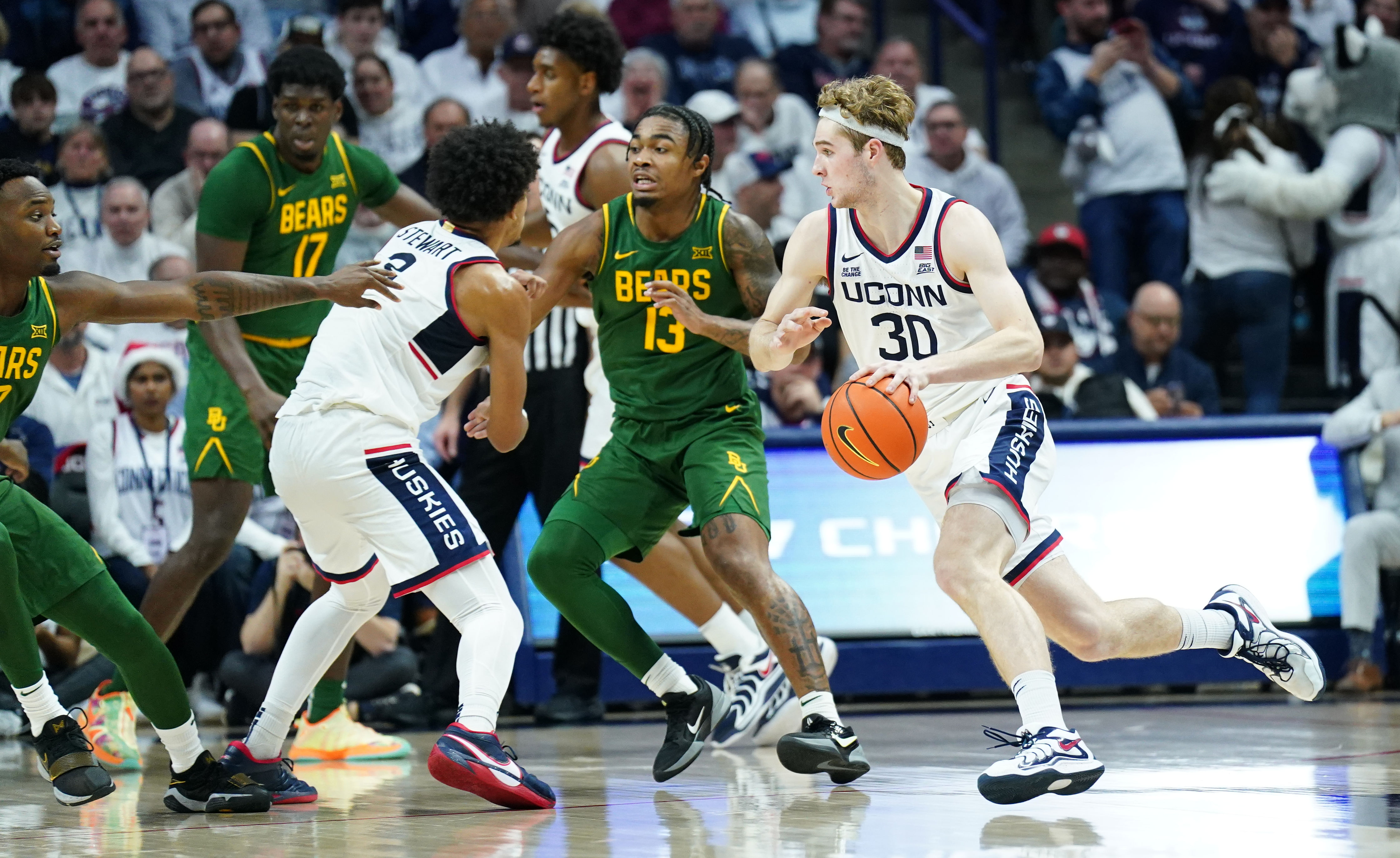 UConn Huskies forward Liam McNeeley (#30) drives the ball against the Baylor Bears in the second half at Harry A. Gampel Pavilion. Photo: Imagn